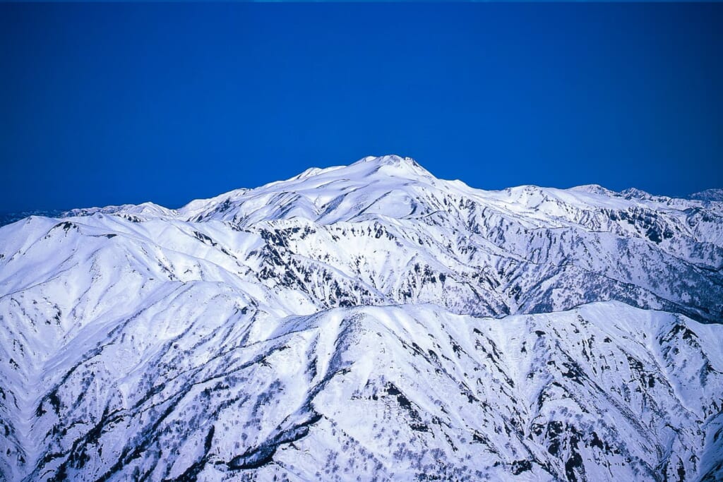 What is TAKASU MOUNTAINS, the largest snow resort area in Central and Western Japan?